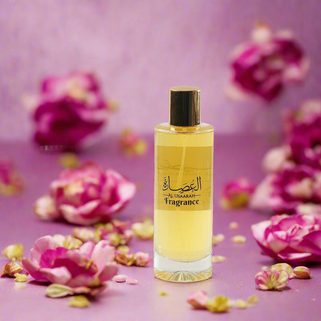  perfume bottles by Al Usaarah Fragrances on a light pink background